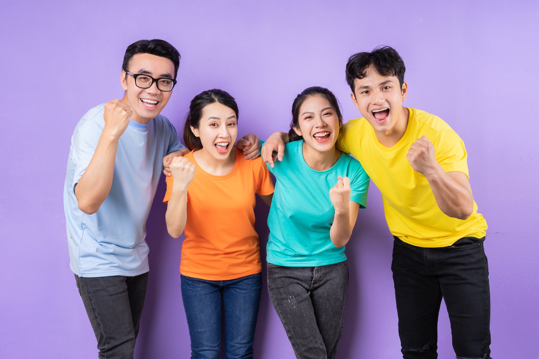 Asian Best Friends Posing on Purple Background